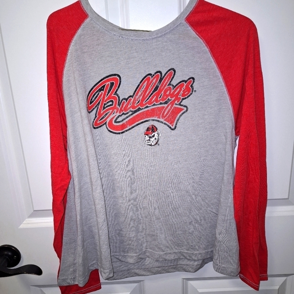 A Champions Ga Bulldog's long sleeve t-shirt.  Pre-owned and in good con…